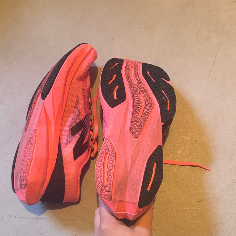 New Balance FuelCell Rebel v4
Women's Pink and Black Athletic Shoes - Picture 2 of 8